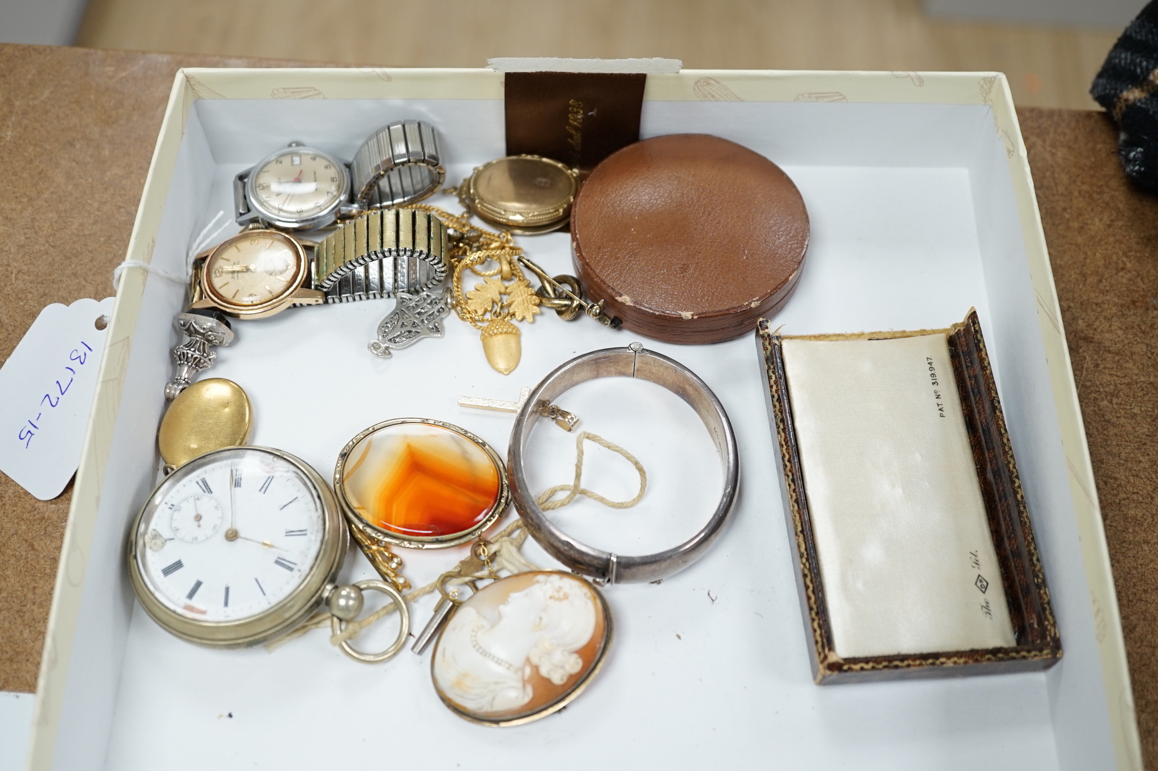 A small group of assorted costume jewellery, wrist and pocket watches and a silver envelope stamp case.